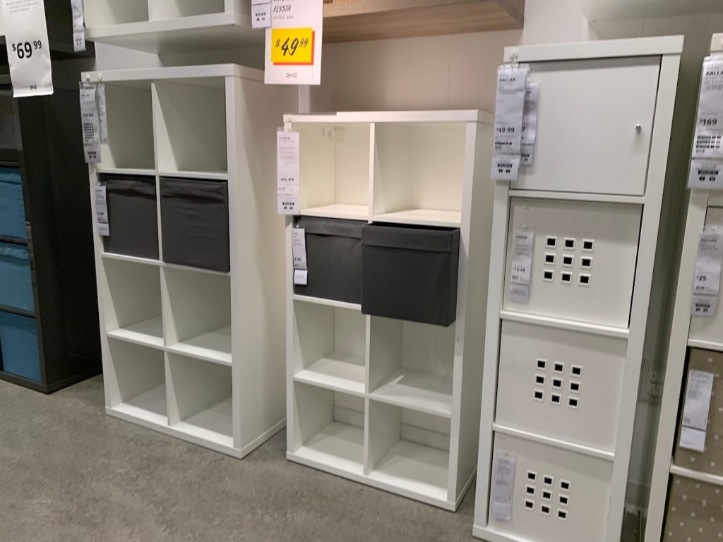 white cubby shelves sitting on floor in IKEA store 